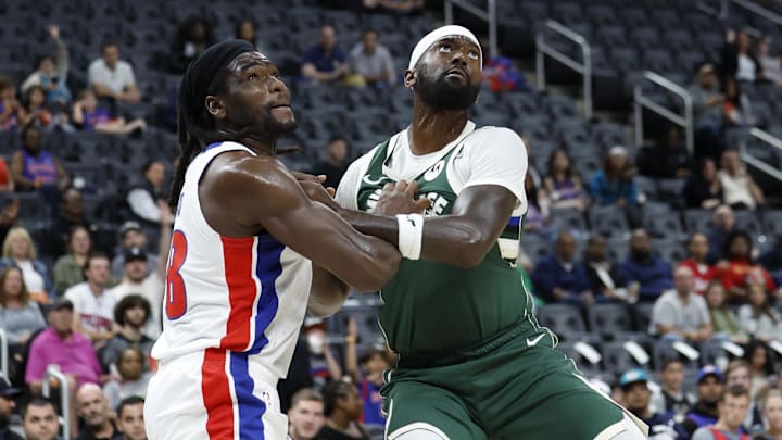 Oct 6, 2024; Detroit, Michigan, USA;  Detroit Pistons center Isaiah Stewart (28) and Milwaukee Bucks forward Bobby Portis (9) look for the rebound in the first half at Little Caesars Arena. Mandatory Credit: Rick Osentoski-Imagn Images