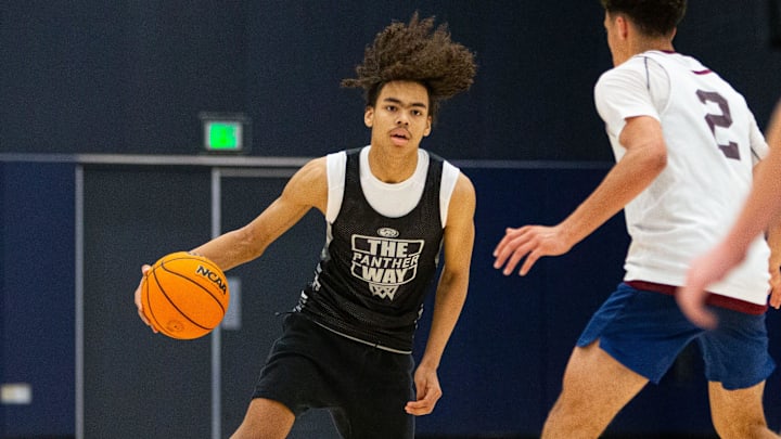 South Bend Washington's Steven Reynolds, left, dribbles the ball up the court during a scrimmage at the Notre Dame Team Camp at Rolfs Athletics Hall on Thursday, June 13, 2024, in South Bend. South Bend Washington's Steven Reynolds, left, dribbles the ball up the court during a scrimmage at the Notre Dame Team Camp at Rolfs Athletics Hall on Thursday, June 13, 2024, in South Bend.