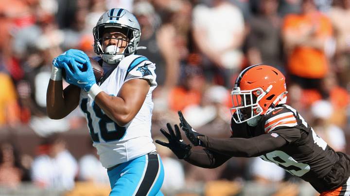 Carolina Panthers wide receiver Jalen Coker (18) makes a catch defended by Cleveland Browns cornerback Mekhi Blackmon (29) during the second quarter at Huntington Bank Field.  Mandatory Credit: Scott Galvin-Imagn Images