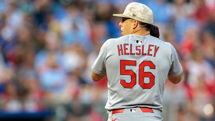 May 17, 2025; Kansas City, Missouri, USA; St. Louis Cardinals pitcher Ryan Helsley (56) pitches during the ninth inning against the Kansas City Royals at Kauffman Stadium. Mandatory Credit: William Purnell-Imagn Images