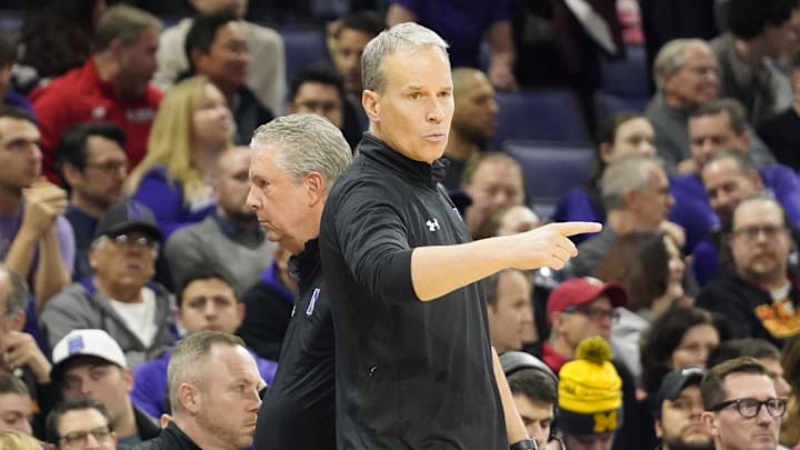 Jan 16, 2025; Evanston, Illinois, USA; Northwestern Wildcats head coach Chris Collins gestures to his team against the Maryland Terrapins  during the first half  at Welsh-Ryan Arena. Mandatory Credit: David Banks-Imagn Images