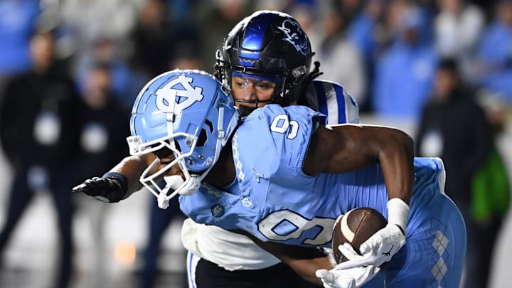 Nov 11, 2023; Chapel Hill, North Carolina, USA; North Carolina Tar Heels wide receiver Devontez Walker (9) is unable to catch the ball as Duke Blue Devils nickle Brandon Johnson (3) defends in the fourth quarter at Kenan Memorial Stadium. Mandatory Credit: Bob Donnan-USA TODAY Sports Nov 11, 2023; Chapel Hill, North Carolina, USA; North Carolina Tar Heels wide receiver Devontez Walker (9) is unable to catch the ball as Duke Blue Devils nickle Brandon Johnson (3) defends in the fourth quarter at Kenan Memorial Stadium. Mandatory Credit: Bob Donnan-USA TODAY Sports