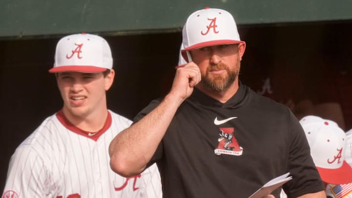 Feb 21, 2026; Tuscaloosa, AL, USA; Head coach Rob Vaughn watches from the dugout during the game with Rhode Island at Sewell-Thomas Stadium in the first game of a Saturday double header.