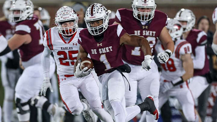 DeSmet Jesuit running back Jayden McCaster breaks into the open against Nixa in Missouri Class 6 state title game. McCaster finished with 200 yards rushing on 13 carries and two touchdowns including a 70-yard run with :40 seconds left to ice the game.