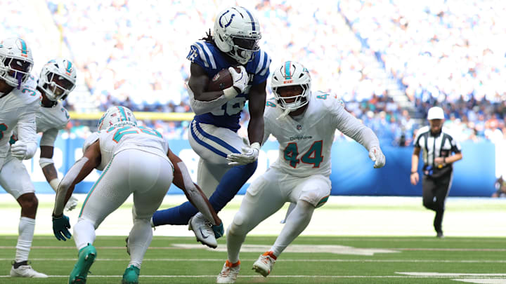 Indianapolis Colts wide receiver Ashton Dulin (16) runs against Miami Dolphins safety Minkah Fitzpatrick (29) and linebacker Chop Robinson (44) during the second half at Lucas Oil Stadium. Indianapolis Colts wide receiver Ashton Dulin (16) runs against Miami Dolphins safety Minkah Fitzpatrick (29) and linebacker Chop Robinson (44) during the second half at Lucas Oil Stadium.
