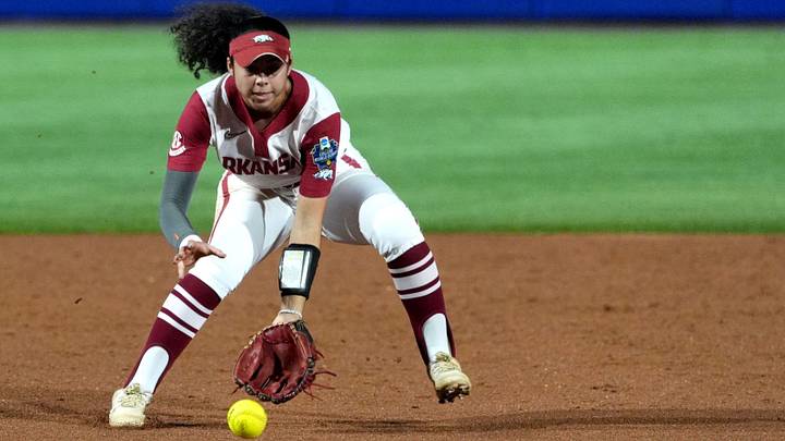 Arkansas' Atalyia Rijo (26) fields a ground ball in the second inning during a Women's College World Series softball game between the Arkansas Razorbacks and the Nebraska Cornhuskers at Devon Park in Oklahoma City, May 28, 2026.