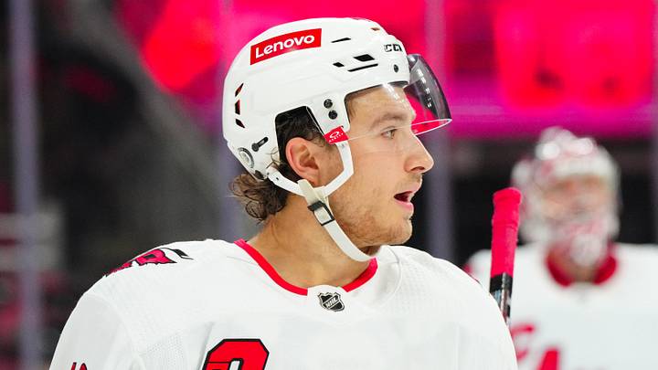 Sep 26, 2023; Raleigh, North Carolina, USA;  Carolina Hurricanes defensemen Justin Robidas (46) looks on against the Tampa Bay Lightning during the second period at PNC Arena. Mandatory Credit: James Guillory-Imagn Images