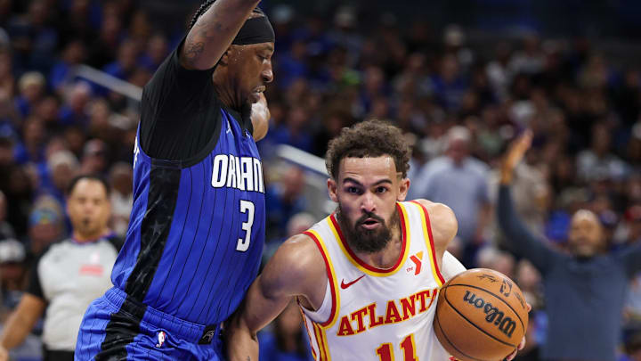 Atlanta Hawks guard Trae Young controls the ball against the Orlando Magic.