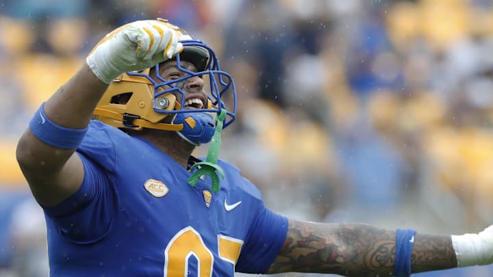 Aug 31, 2024; Pittsburgh, Pennsylvania, USA; Pittsburgh Panthers defensive lineman Isaiah Neal (97) celebrates a defensive stop against the Kent State Golden Flashes during the second quarter at Acrisure Stadium. Mandatory Credit: Charles LeClaire-Imagn Images Aug 31, 2024; Pittsburgh, Pennsylvania, USA; Pittsburgh Panthers defensive lineman Isaiah Neal (97) celebrates a defensive stop against the Kent State Golden Flashes during the second quarter at Acrisure Stadium. Mandatory Credit: Charles LeClaire-Imagn Images