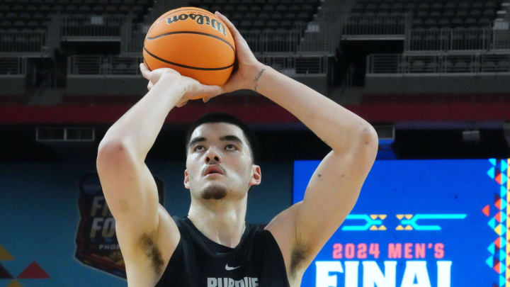 Purdue center Zach Edey (15) shoots free throws during practice 