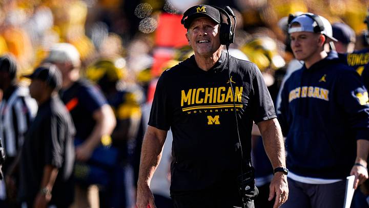 Michigan head coach Kyle Whittingham watches a play against Iowa Michigan head coach Kyle Whittingham watches a play against Iowa