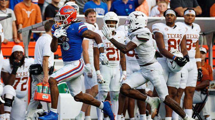 Oct 4, 2025; Gainesville, Florida, USA; Florida Gators wide receiver Dallas Wilson (6) runs with the ball after a catch while Texas Longhorns defensive back Jelani McDonald (4) defends during the second half at Ben Hill Griffin Stadium. Mandatory Credit: Matt Pendleton-Imagn Images Oct 4, 2025; Gainesville, Florida, USA; Florida Gators wide receiver Dallas Wilson (6) runs with the ball after a catch while Texas Longhorns defensive back Jelani McDonald (4) defends during the second half at Ben Hill Griffin Stadium. Mandatory Credit: Matt Pendleton-Imagn Images