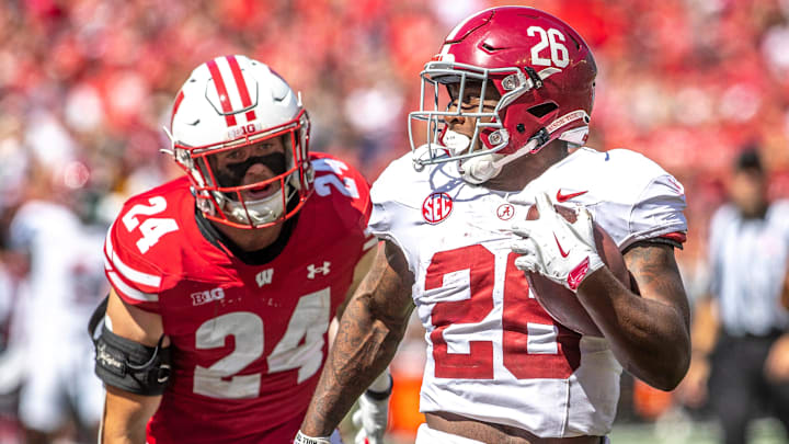 Alabama running back Jam Miller (26) runs a touchdown from Wisconsin Hunter Wohler during the game at Camp Randall Stadium in Madison, Wis. on Saturday, September 14, 2024.
