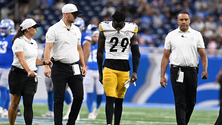 Aug 24, 2024; Detroit, Michigan, USA; Pittsburgh Steelers cornerback Ryan Watts (29) walks off the field after being injured against the Detroit Lions late in the fourth quarter at Ford Field. Mandatory Credit: Lon Horwedel-Imagn Images Aug 24, 2024; Detroit, Michigan, USA; Pittsburgh Steelers cornerback Ryan Watts (29) walks off the field after being injured against the Detroit Lions late in the fourth quarter at Ford Field. Mandatory Credit: Lon Horwedel-Imagn Images