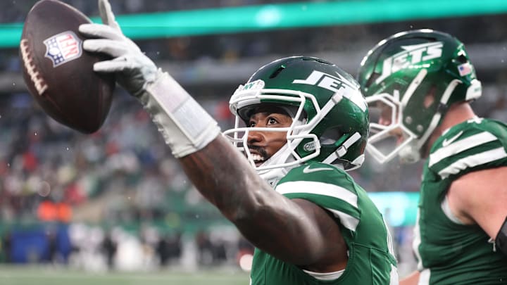 Nov 30, 2025; East Rutherford, New Jersey, USA; New York Jets quarterback Tyrod Taylor (2) reacts after a touchdown against the Atlanta Falcons during the second half at MetLife Stadium. Mandatory Credit: Vincent Carchietta-Imagn Images