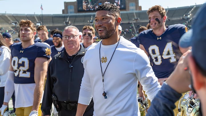 Apr 12, 2025; Notre Dame, IN, USA; Notre Dame Fighting Irish head coach Marcus Freeman smiles as he walks off the field after the Blue-Gold game at Notre Dame Stadium. Apr 12, 2025; Notre Dame, IN, USA; Notre Dame Fighting Irish head coach Marcus Freeman smiles as he walks off the field after the Blue-Gold game at Notre Dame Stadium.