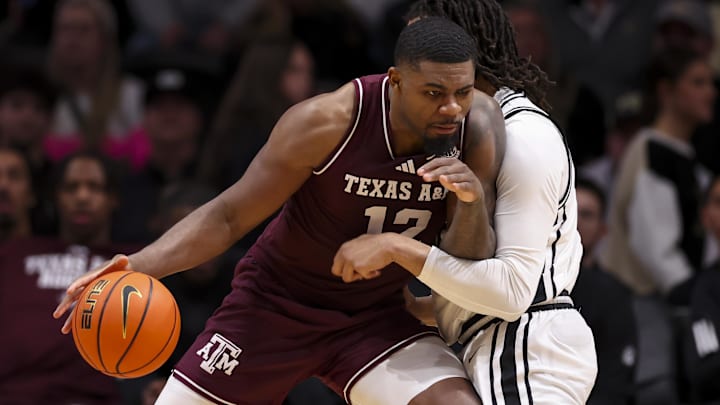 Texas A&M Aggies forward Rashaun Agee (12) backs down  Vanderbilt Commodores forward Devin McGlockton (99) during the second half at Memorial Gymnasium.