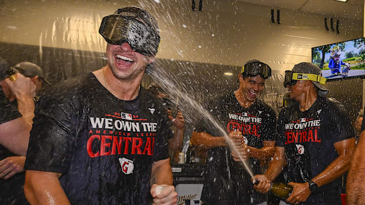 Sep 21, 2024; St. Louis, Missouri, USA;  The Cleveland Guardians spray champagne in the locker room after the Guardians clinched the AL central division title after a game against the St. Louis Cardinals at Busch Stadium. Mandatory Credit: Jeff Curry-Imagn Images
