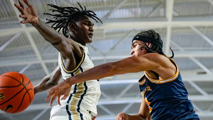 Wheeler Wildcats guard Kevin Savage III (right) put the Auburn Tigers in his final six teams ahead of his commitment.