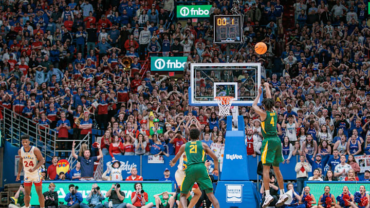 Feb 10, 2024; Lawrence, Kansas, USA; Baylor Bears guard Ja'Kobe Walter (4) attempts a three-point shot