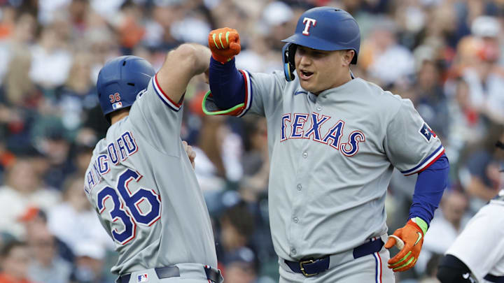 May 10, 2025; Detroit, Michigan, USA; Texas Rangers designated hitter Joc Pederson (4) receives congratulations from left fielder Wyatt Langford (36) after he hits a two run home run in the third inning against the Detroit Tigers at Comerica Park. May 10, 2025; Detroit, Michigan, USA; Texas Rangers designated hitter Joc Pederson (4) receives congratulations from left fielder Wyatt Langford (36) after he hits a two run home run in the third inning against the Detroit Tigers at Comerica Park.