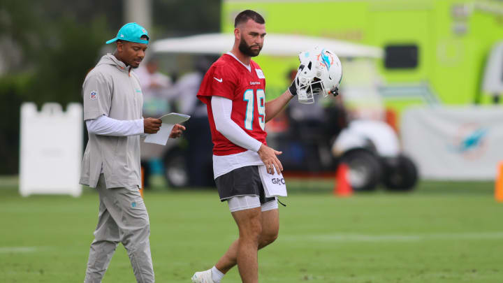 Jul 24, 2024; Miami Gardens, FL, USA; Miami Dolphins quarterback Skylar Thompson (19) looks on during training camp at Baptist Health Training Complex. Jul 24, 2024; Miami Gardens, FL, USA; Miami Dolphins quarterback Skylar Thompson (19) looks on during training camp at Baptist Health Training Complex.