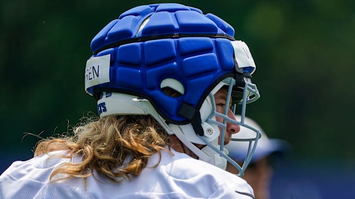 Indianapolis Colts tight end Tyler Warren (84) walks off the field Tuesday, June 10, 2025, during NFL Colts mandatory mini camp at the Indiana Farm Bureau Football Center in Indianapolis.