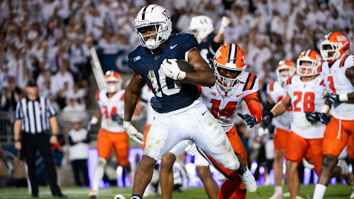 Penn State running back Nick Singleton (10) scores a 4-yard rushing touchdown in the third quarter of a Big Ten football game against Illinois, Saturday, Sept. 28, 2024, in State College, Pa.