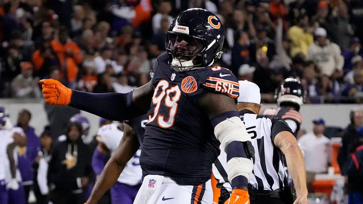 Sep 8, 2025; Chicago, Illinois, USA; Chicago Bears defensive tackle Gervon Dexter Sr. (99) reacts after a sack against the Minnesota Vikings during the second half at Soldier Field. Mandatory Credit: David Banks-Imagn Images