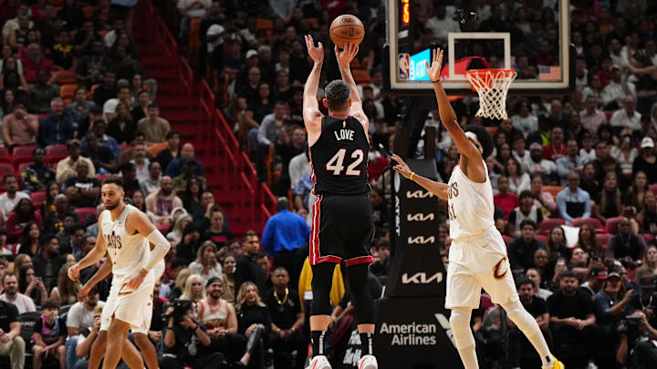 Dec 8, 2023; Miami, Florida, USA; Miami Heat forward Kevin Love (42) attempts a three point shot over Cleveland Cavaliers center Jarrett Allen (31) during the second half at Kaseya Center. Mandatory Credit: Jasen Vinlove-Imagn Images Dec 8, 2023; Miami, Florida, USA; Miami Heat forward Kevin Love (42) attempts a three point shot over Cleveland Cavaliers center Jarrett Allen (31) during the second half at Kaseya Center. Mandatory Credit: Jasen Vinlove-Imagn Images