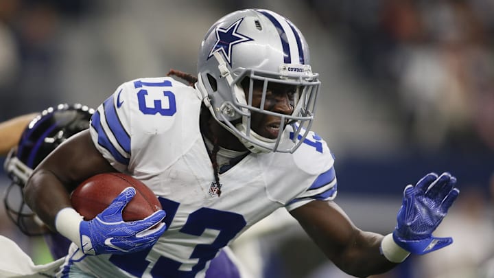 Nov 20, 2016; Arlington, TX, USA; Dallas Cowboys wide receiver Lucky Whitehead (13) runs the ball after fielding a punt in the third quarter against the Baltimore Ravens at AT&T Stadium.
