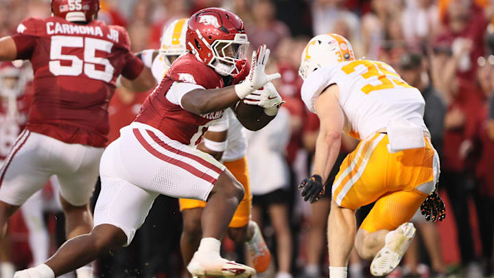 Oct 5, 2024; Fayetteville, Arkansas, USA; Arkansas Razorbacks running back Braylen Russell (0) rushes in the first quarter against the Tennessee Volunteers at Donald W. Reynolds Razorback Stadium. Mandatory Credit: Nelson Chenault-Imagn Images