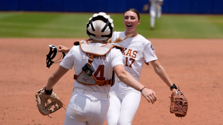 Texas pitcher Teagan Kavan (17) and Reese Atwood (14) celebrate after a Women's College World Series softball game between the Tennessee Volunteers and the Texas Longhorns at Devon Park in Oklahoma City, Monday, June 2, 2025. Texas won 2-0.