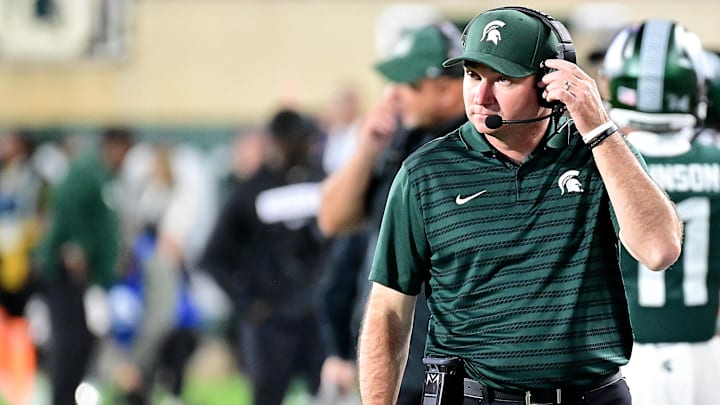 Sep 28, 2024; East Lansing, Michigan, USA; Michigan State Spartans head coach Jonathan Smith watches from the sidelines during the fourth quarter as the Ohio State Buckeyes defeat his team at Spartan Stadium. Mandatory Credit: Dale Young-Imagn Images