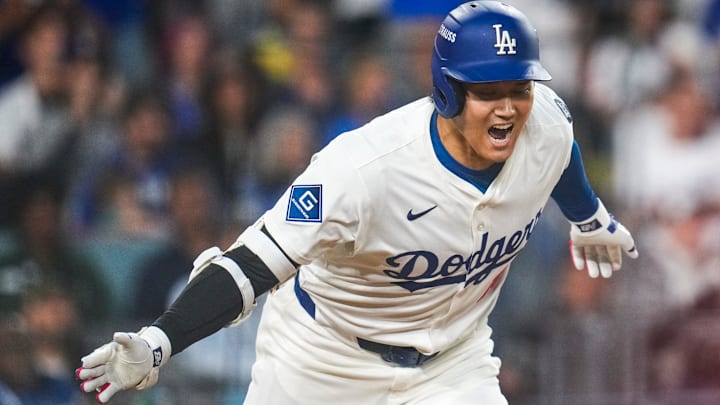 Los Angeles Dodgers designated hitter Shohei Ohtani (17) celebrates as he runs for first on an RBI single in the sixth inning of the MLB National League Wild Card Game 2 between the Los Angeles Dodgers and the Cincinnati Reds at Dodger Stadium in Los Angeles on Wednesday, Oct. 1, 2025. The Reds were eliminated from the postseason with an 8-4 loss to the reigning World Series Champions Dodgers.