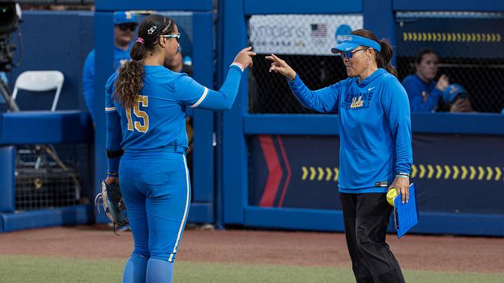 May 28, 2026; Oklahoma City, OK, USA; UCLA Bruins head coach Kelly Inouye-Perez and infielder Jordan Woolery (15) point at each other in the second inning against the Alabama Crimson Tide during the NCAA Women’s College World Series at Devon Park. Alabama won 6-3. May 28, 2026; Oklahoma City, OK, USA; UCLA Bruins head coach Kelly Inouye-Perez and infielder Jordan Woolery (15) point at each other in the second inning against the Alabama Crimson Tide during the NCAA Women’s College World Series at Devon Park. Alabama won 6-3.