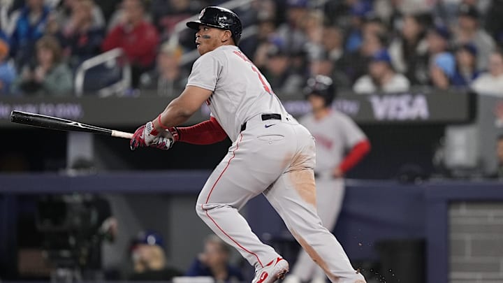 Apr 30, 2025; Toronto, Ontario, CAN; Boston Red Sox designated hitter Rafael Devers (11) hits a one-run double against the Toronto Blue Jays during the second inning at Rogers Centre. Mandatory Credit: John E. Sokolowski-Imagn Images Apr 30, 2025; Toronto, Ontario, CAN; Boston Red Sox designated hitter Rafael Devers (11) hits a one-run double against the Toronto Blue Jays during the second inning at Rogers Centre. Mandatory Credit: John E. Sokolowski-Imagn Images
