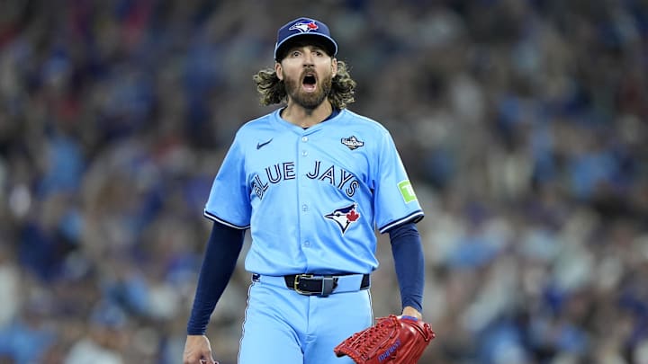 Blue Jays pitcher Kevin Gausman (34) reacts after striking out Los Angeles Dodgers first baseman Freddie Freeman (5) in the first inning during game six of the 2025 MLB World Series at Rogers Centre.