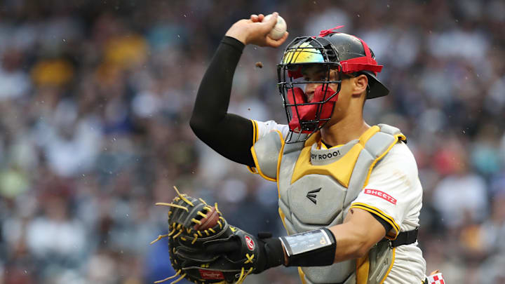 Apr 5, 2025; Pittsburgh, Pennsylvania, USA;  Pittsburgh Pirates catcher Endy Rodriguez (5) chases New York Yankees second baseman Jazz Chisholm Jr. (not pictured) in a fielders choice run down during the seventh inning at PNC Park. Mandatory Credit: Charles LeClaire-Imagn Images