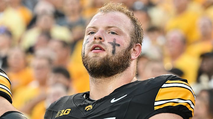 Sep 13, 2025; Iowa City, Iowa, USA; Iowa Hawkeyes offensive lineman Logan Jones (65) looks on before the game against the Massachusetts Minutemen at Kinnick Stadium. Mandatory Credit: Jeffrey Becker-Imagn Images Sep 13, 2025; Iowa City, Iowa, USA; Iowa Hawkeyes offensive lineman Logan Jones (65) looks on before the game against the Massachusetts Minutemen at Kinnick Stadium. Mandatory Credit: Jeffrey Becker-Imagn Images