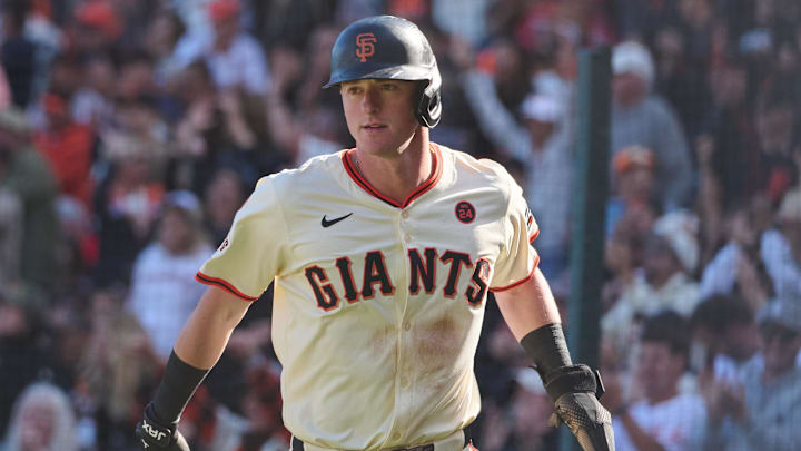 Sep 28, 2024; San Francisco, California, USA; San Francisco Giants infielder Tyler Fitzgerald (49) reacts after scoring the go-ahead run against the St. Louis Cardinals during the eighth inning at Oracle Park. 