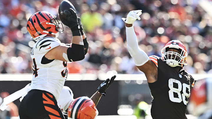 Oct 20, 2024; Cleveland, Ohio, USA; Cincinnati Bengals defensive end Sam Hubbard (94) intercepts a pass during the second half against the Cleveland Browns at Huntington Bank Field. Mandatory Credit: Ken Blaze-Imagn Images