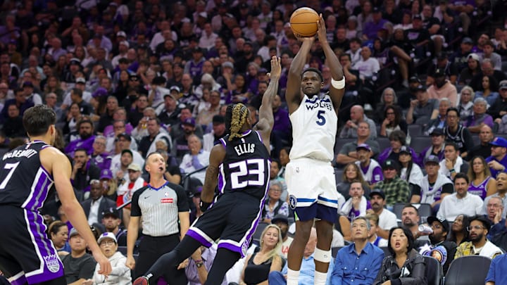 Oct 24, 2024; Sacramento, California, USA; Minnesota Timberwolves guard Anthony Edwards (5) shoots the ball over Sacramento Kings guard Keon Ellis (23) during the fourth quarter at Golden 1 Center. Mandatory Credit: Sergio Estrada-Imagn Images