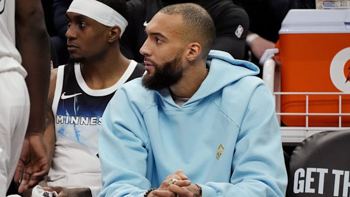 Minnesota Timberwolves center Rudy Gobert watches his team as they play the Oklahoma City Thunder in the second quarter at Target Center in Minneapolis on Feb. 13, 2025.