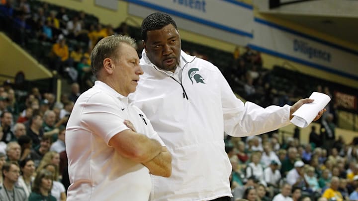Nov 28, 2014; Kissimmee, FL, USA; Marquette Golden Eagles associate head coach Dwayne Stephens and head coach Tom Izzo talk during the first half against the Marquette Golden Eagles at HP Field House. Mandatory Credit: Kim Klement-Imagn Images Nov 28, 2014; Kissimmee, FL, USA; Marquette Golden Eagles associate head coach Dwayne Stephens and head coach Tom Izzo talk during the first half against the Marquette Golden Eagles at HP Field House. Mandatory Credit: Kim Klement-Imagn Images