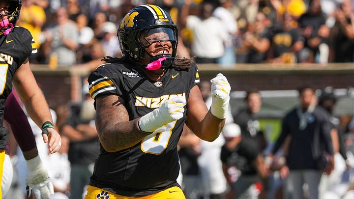 Oct 10, 2026; Columbia, Missouri, USA; Missouri Tigers defensive tackle Donta Simpson (8) celebrates after a sack against the Texas A&M Aggies during the second half of the game at Faurot Field at Memorial Stadium. Mandatory Credit: Denny Medley-Imagn Images