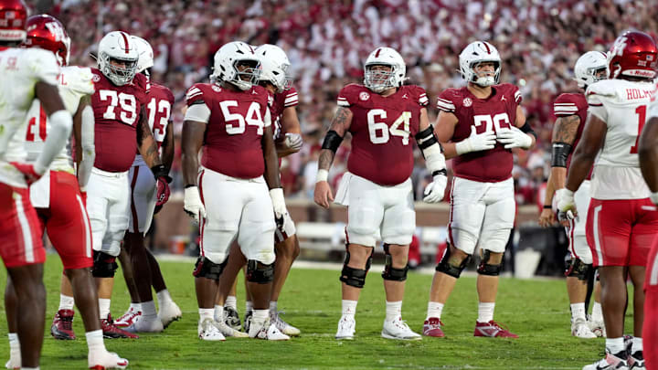 Oklahoma Sooners offensive lineman Jake Taylor (79), offensive lineman Febechi Nwaiwu (54), offensive lineman Joshua Bates (64) and offensive lineman Jacob Sexton (76) walk to the line during a college football game between the University of Oklahoma Sooners (OU) and the Houston Cougars at Gaylord Family–Ð Oklahoma Memorial Stadium in Norman, Okla., Saturday, Sept. 7, 2024.