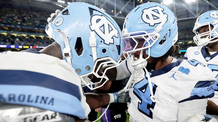 Aug 29, 2026; Dublin, Co. Dublin, IRL; North Carolina Tar Heels offensive lineman Andrew Threatt (75) and wide receiver Mason Humphrey (4) celebrate after the game against the TCU Horned Frogs at Aviva Stadium. Mandatory Credit: Laszlo Geczo-Imagn Images Aug 29, 2026; Dublin, Co. Dublin, IRL; North Carolina Tar Heels offensive lineman Andrew Threatt (75) and wide receiver Mason Humphrey (4) celebrate after the game against the TCU Horned Frogs at Aviva Stadium. Mandatory Credit: Laszlo Geczo-Imagn Images