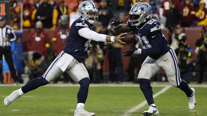 Jan 8, 2023; Landover, Maryland, USA; Dallas Cowboys quarterback Dak Prescott (4) hands the ball off