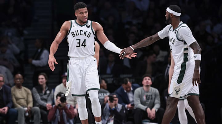 Dec 27, 2023; Brooklyn, New York, USA: Milwaukee Bucks forward Giannis Antetokounmpo (34) slaps hands with forward Bobby Portis (9) during the first half against the Brooklyn Nets at Barclays Center. Mandatory Credit: Vincent Carchietta-Imagn Images Dec 27, 2023; Brooklyn, New York, USA: Milwaukee Bucks forward Giannis Antetokounmpo (34) slaps hands with forward Bobby Portis (9) during the first half against the Brooklyn Nets at Barclays Center. Mandatory Credit: Vincent Carchietta-Imagn Images